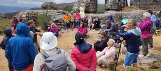 Una veintena de personas participan visitan Portalén