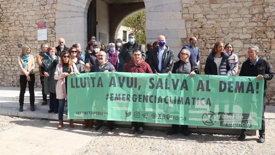 La comunitat científica de la UdG es planta al rectorat en contra del canvi climàtic