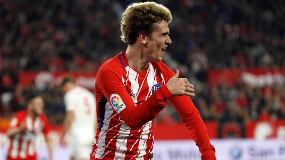 Griezmann celebra uno de sus goles ante el Sevilla