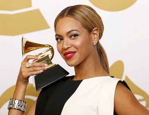 Beyonce poses with her award for Best Traditional R&B Performance for "Love On Top" at the 55th annual Grammy Awards in Los Angeles
