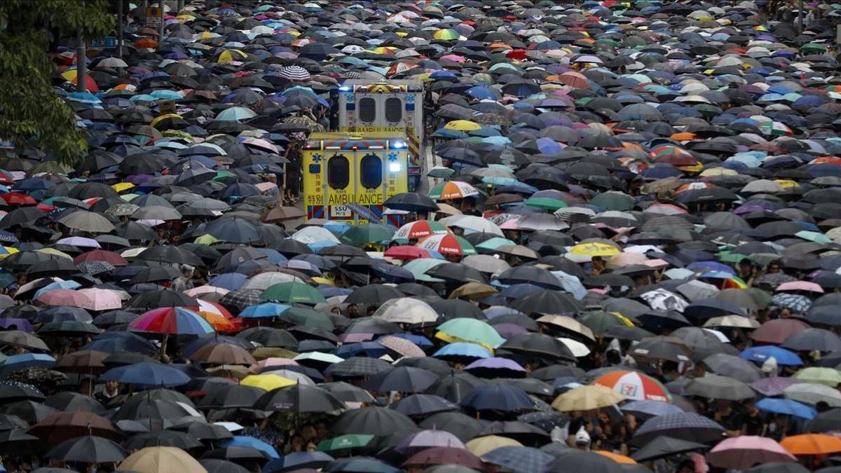 Manifestación en las calles de Hong Kong, este domingo.