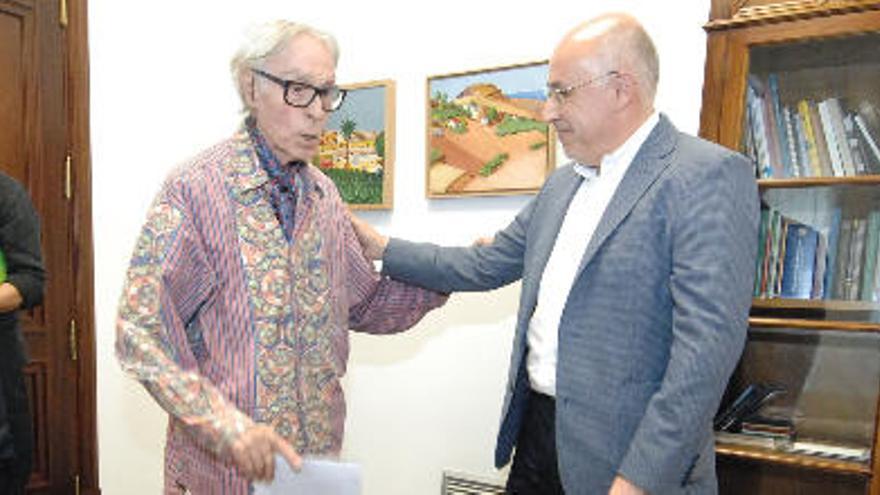 Pepe Dámaso con Antonio Morales. Al fondo, Andrés Santana.