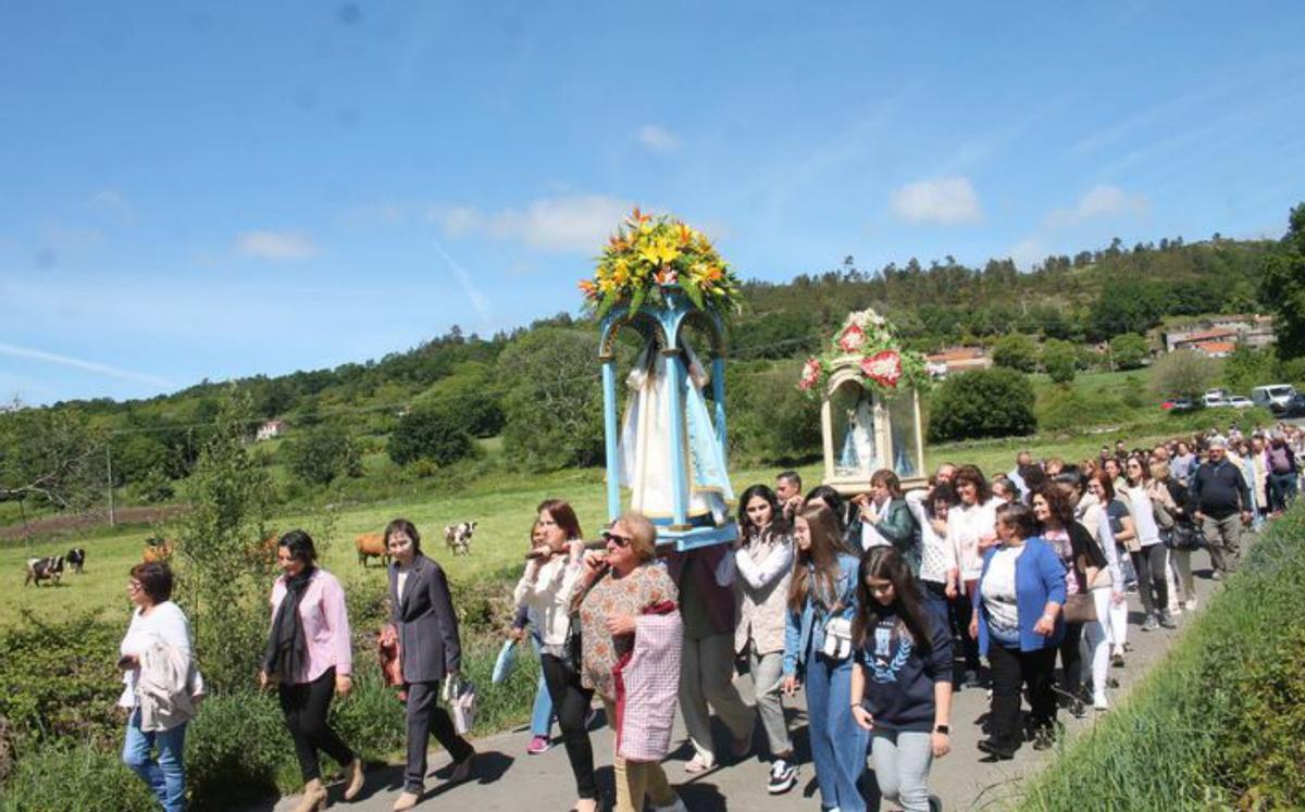 As imaxes da Virxe de Río e de San Xoán de Camba no encontro.