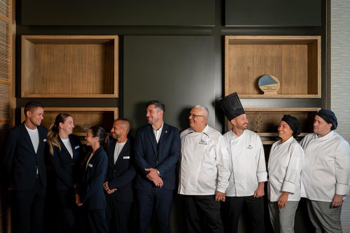 El equipo de cocina y de sala del restaurante.
