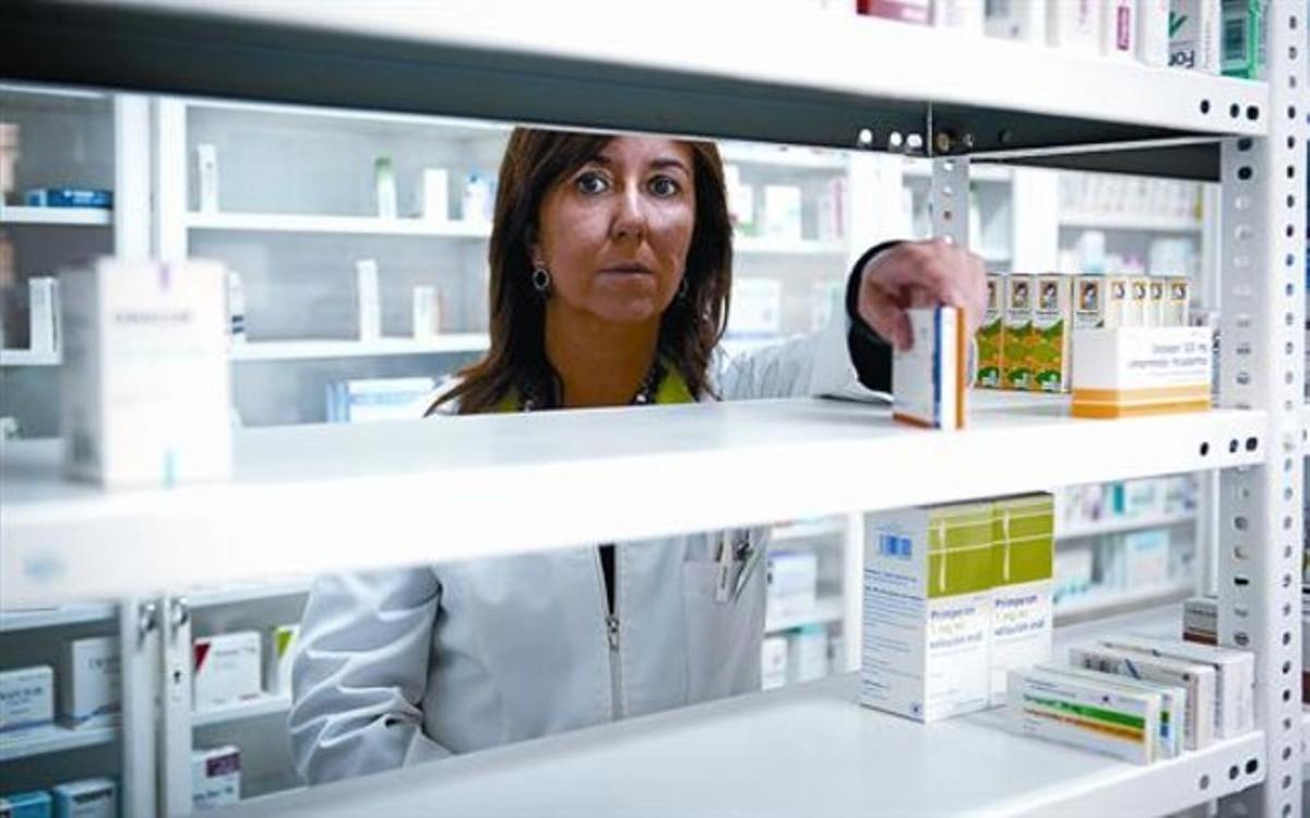 Prestatges semibuits 8La farmacèutica Laura Mercader, al seu establiment de Sabadell, dimecres passat. Prestatges semibuits 8La farmacèutica Laura Mercader, al seu establiment de Sabadell, dimecres passat.