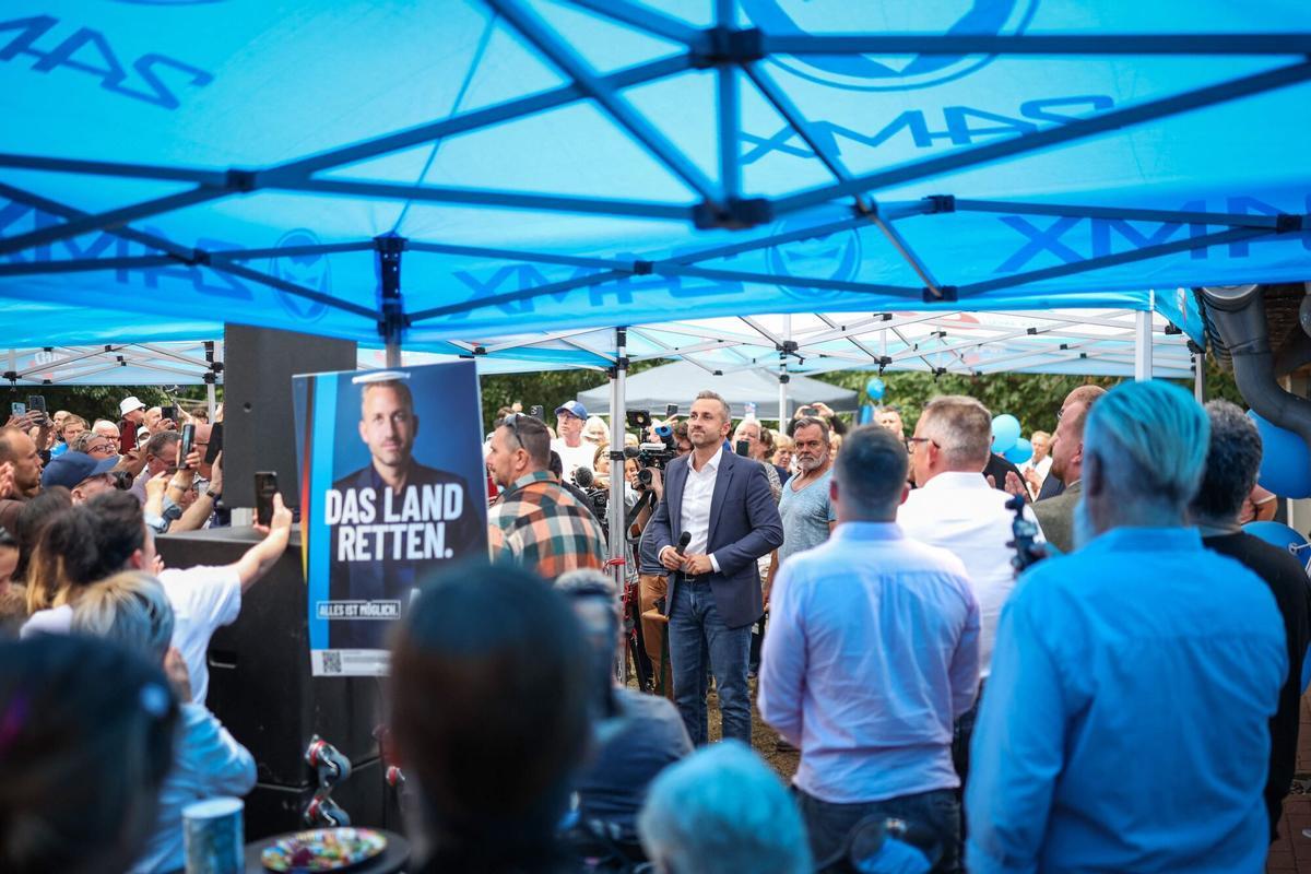 Ulrich Siegmund (C), far-right Alternative for Germany (AfD)'s main candidate in the Saxony-Anhalt state election, addresses supporters during an election campaign event in Haldensleben, eastern Germany on September 1, 2026. Voters in the eastern federal state of Saxony-Anhalt will go to the polls in regional elections on September 6, 2026. (Photo by Ronny HARTMANN / AFP)