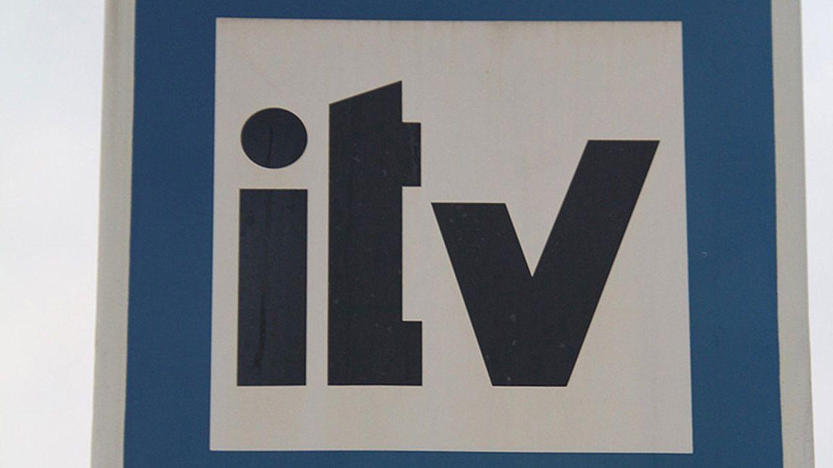 Un cartell anuncia una estació per passar la ITV