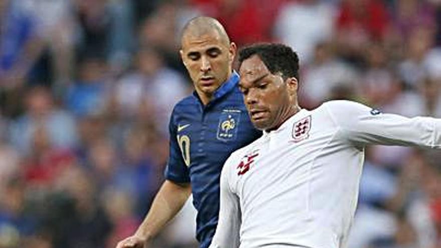 Lescott, con Benzema. | Reuters