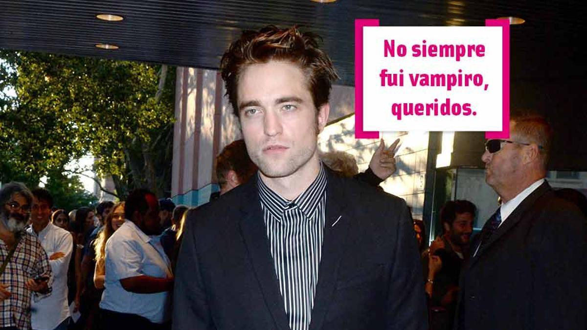 Robert Pattinson posando para la prensa con cara de aburrido