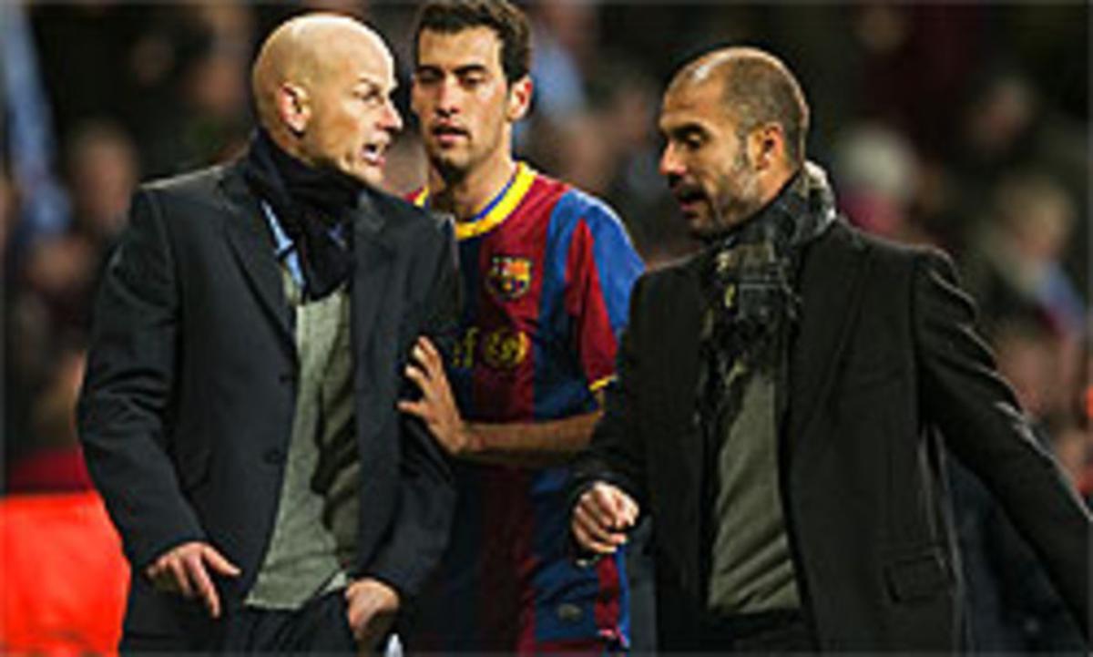 Busquets separa Solbakken i Guardiola, al final del partit. Busquets separa Solbakken i Guardiola, al final del partit.