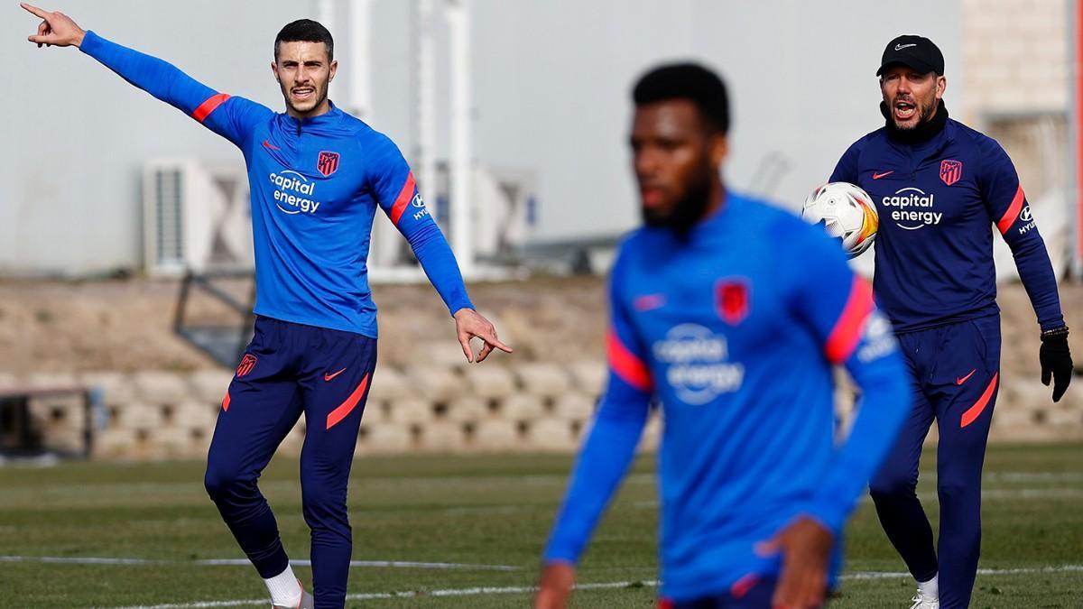 Hermoso junto a Simeone, en el entrenamiento del Atlético