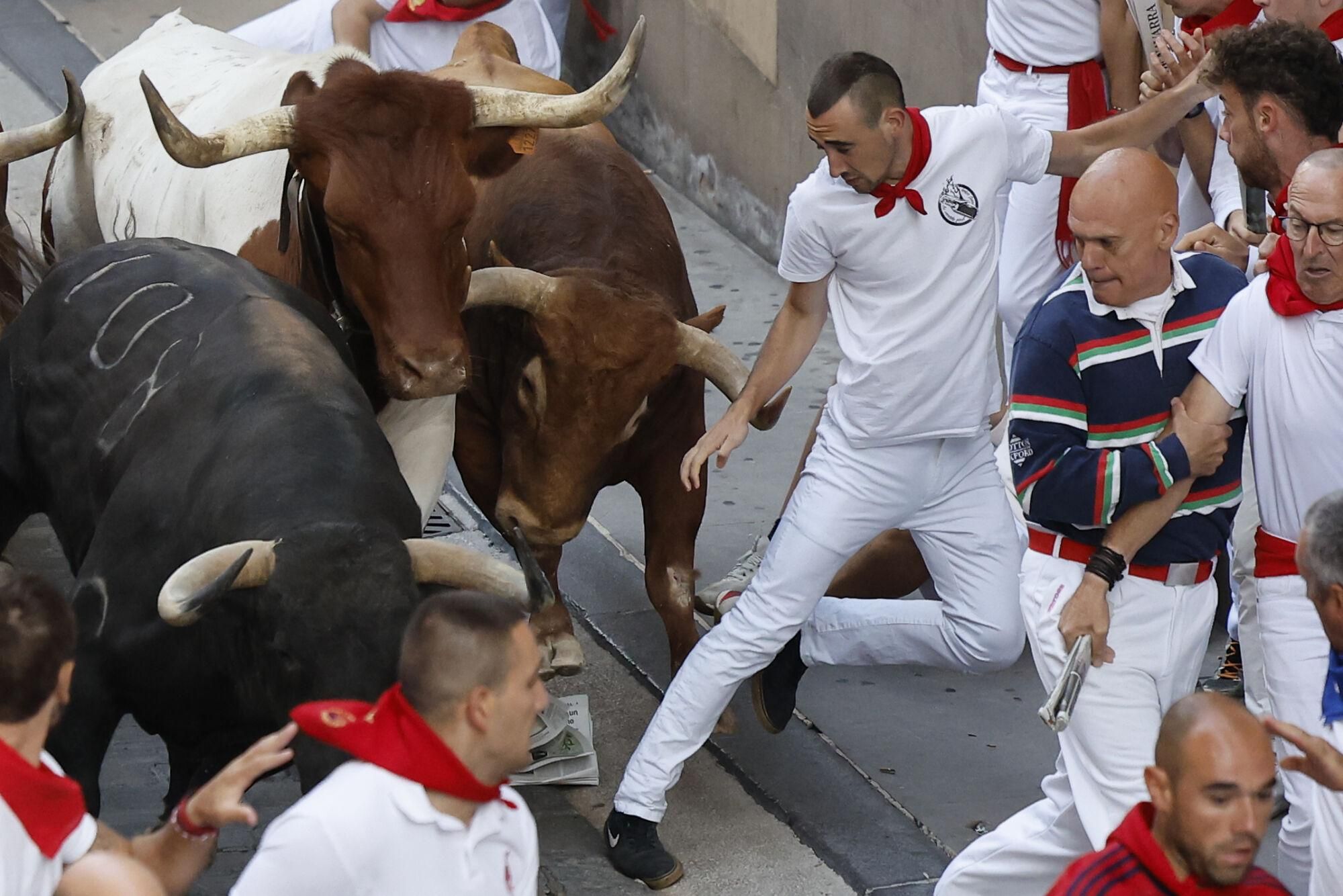 El quinto encierro de los Sanfermines 2025, en imágenes.