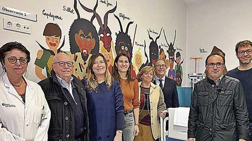 El equipo de &#039;Na Marga somriu&#039; y las autoridades, ayer en la inauguración.