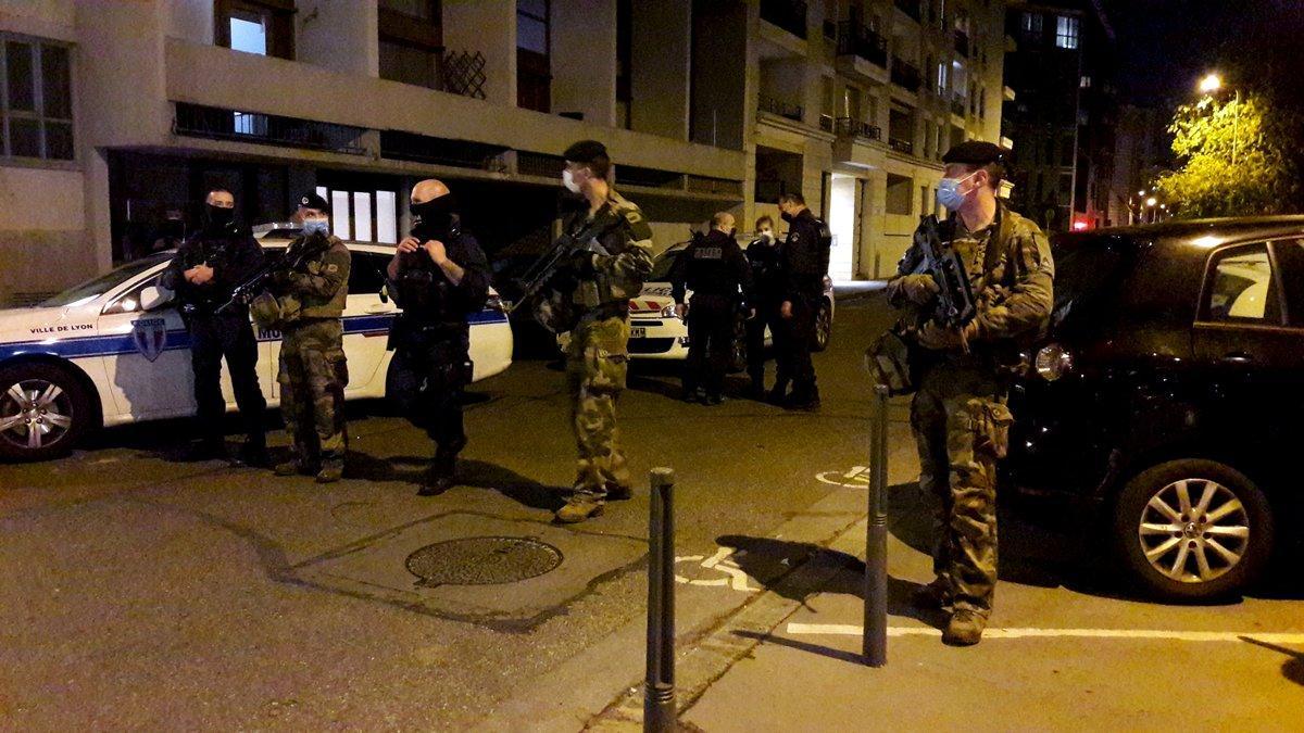 Police secures a street after a Greek Orthodox priest was shot and injured at a church in the centre of Lyon, France October 31, 2020. REUTERS/Cecile Mantovani