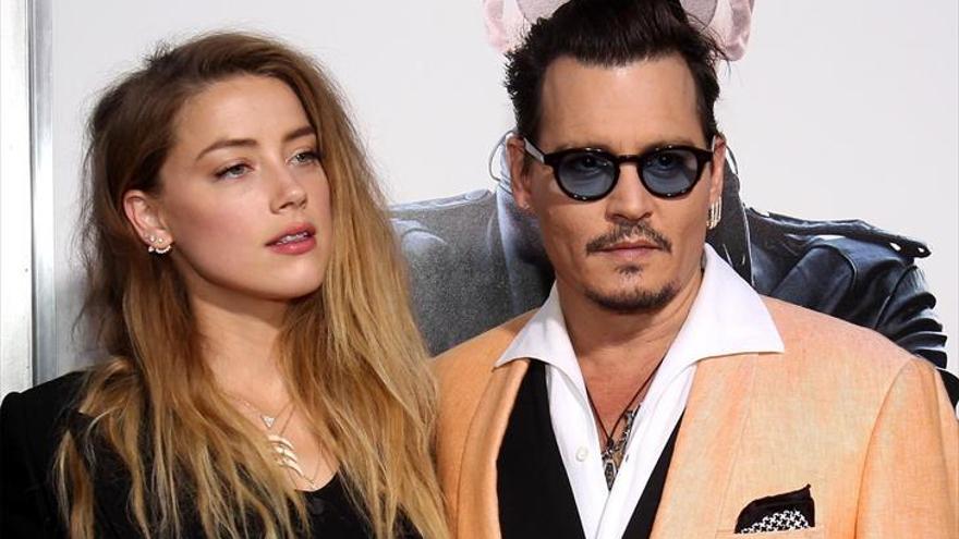 La actriz Amber Heard dona el dinero del divorcio