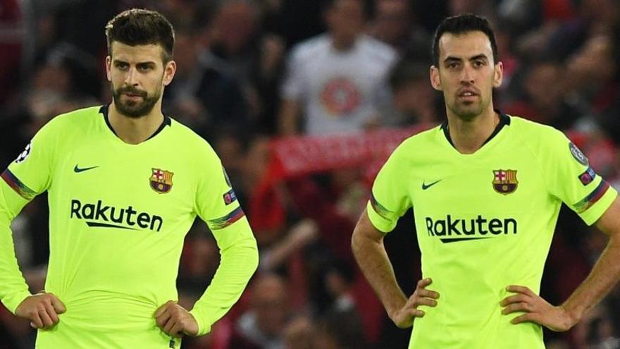 Busquets y PiquÃ©, en Anfield.