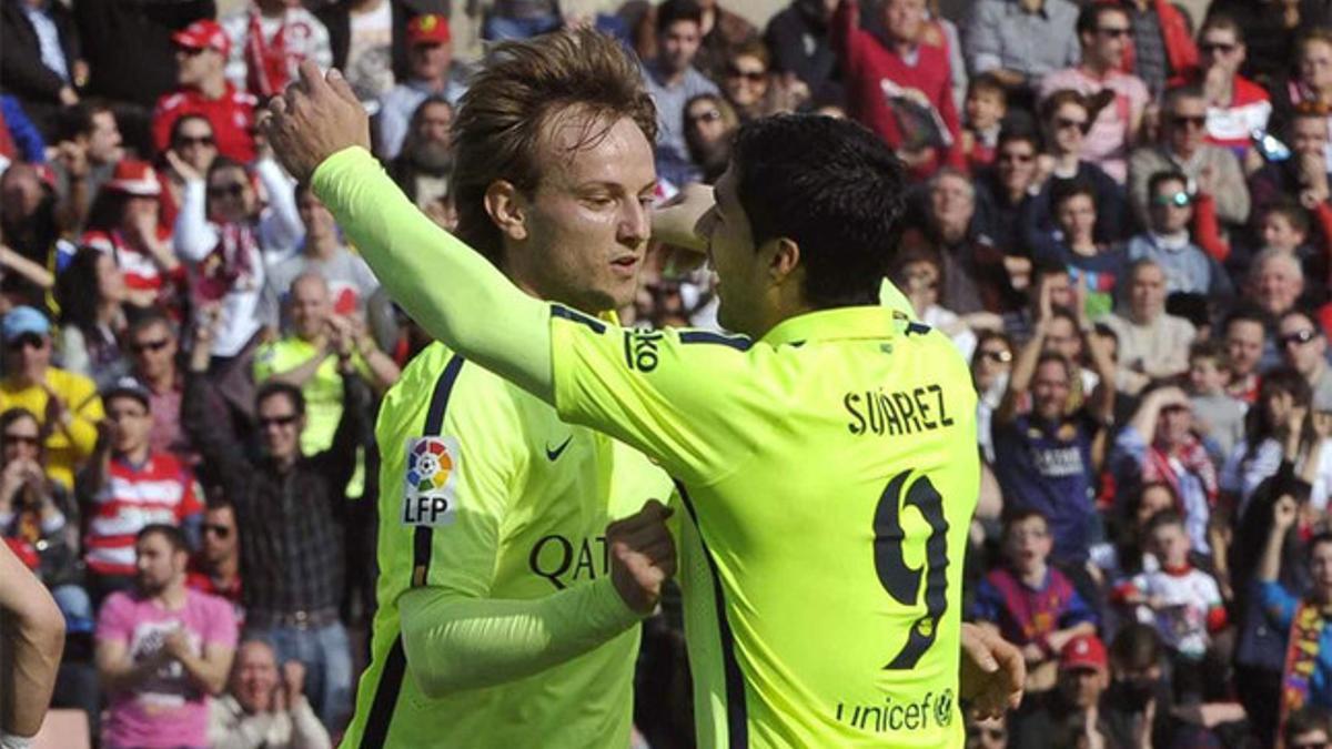 Rakitic y Suárez celebran su gran partido en Granada