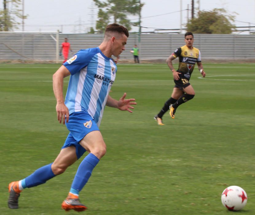 El filial malaguista empata a cero con el conjunto murciano en la ida y se jugará el ascenso en la vuelta.