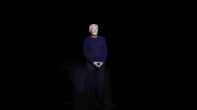 FILE - Italian fashion designer Giorgio Armani acknowledges the applause after presenting the Emporio Armani mens Fall-Winter 2016-2017 collection, part of the Milan Fashion Week, unveiled in Milan, Italy, Jan. 18, 2016. (AP Photo/Luca Bruno, file). FILE