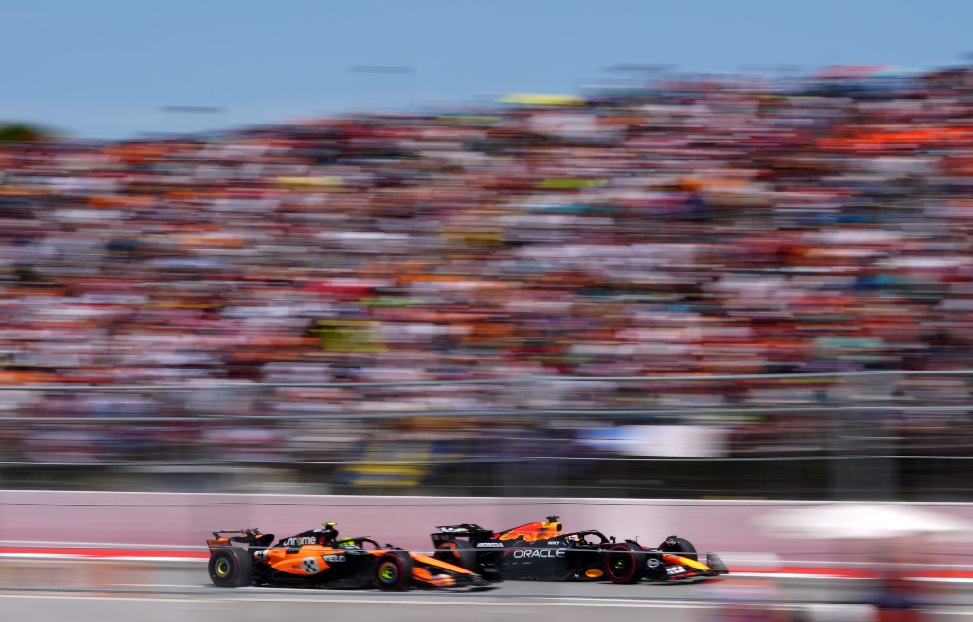 01 June 2025, Spain, Barcelona: British Formula One driver Lando Norris of the McLaren team (L) overtakes Dutch driver Max Verstappen of Red Bull Racing's team, during the Formula 1 Spanish Grand Prix race at the Circuit de Barcelona-Catalunya. Photo: Bradley Collyer/PA Wire/dpa 01/06/2025 ONLY FOR USE IN SPAIN. Bradley Collyer/PA Wire/dpa;motor rallying;motorsport;sports;Formula 1 Spanish Grand Prix - Race Day;