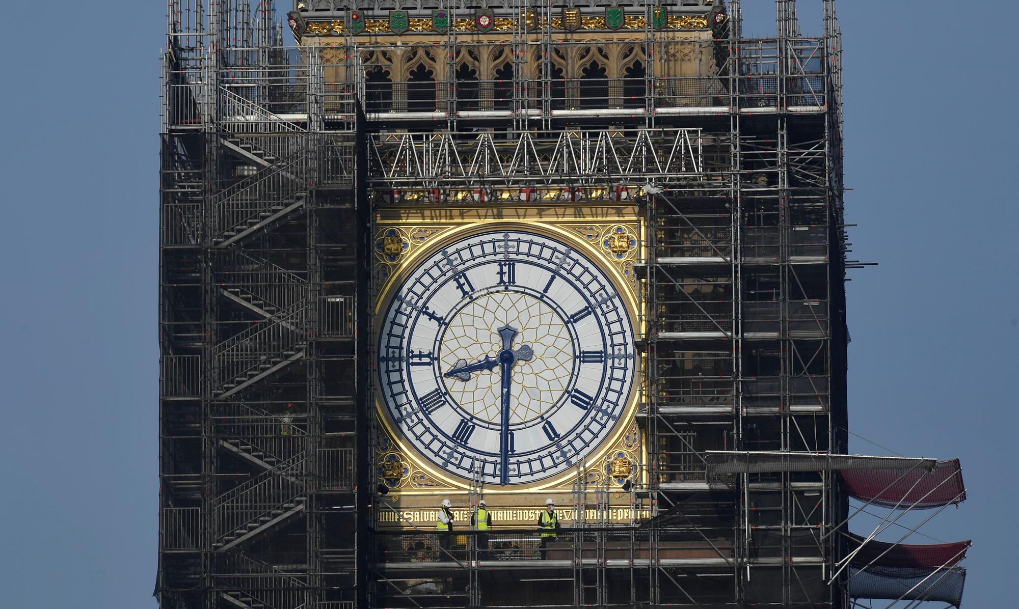 Big Ben clock hands restored to original blue colour as renovations continue at the Houses of Parliament, London