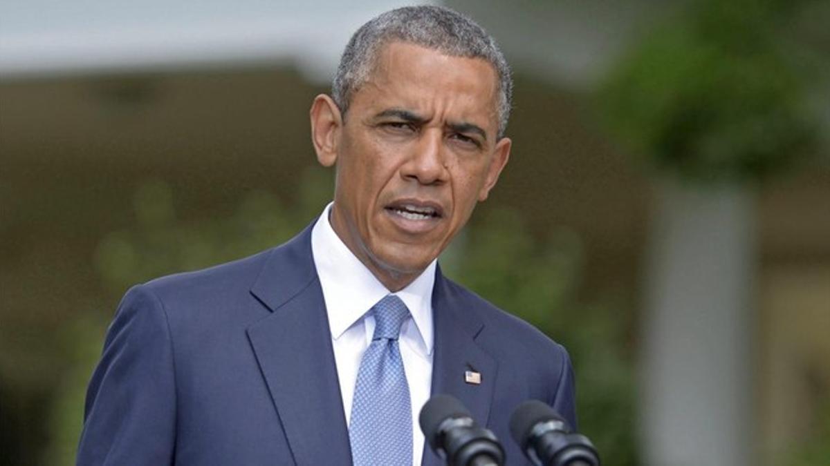 Obama, en los jardines de la Casa Blanca, este lunes.