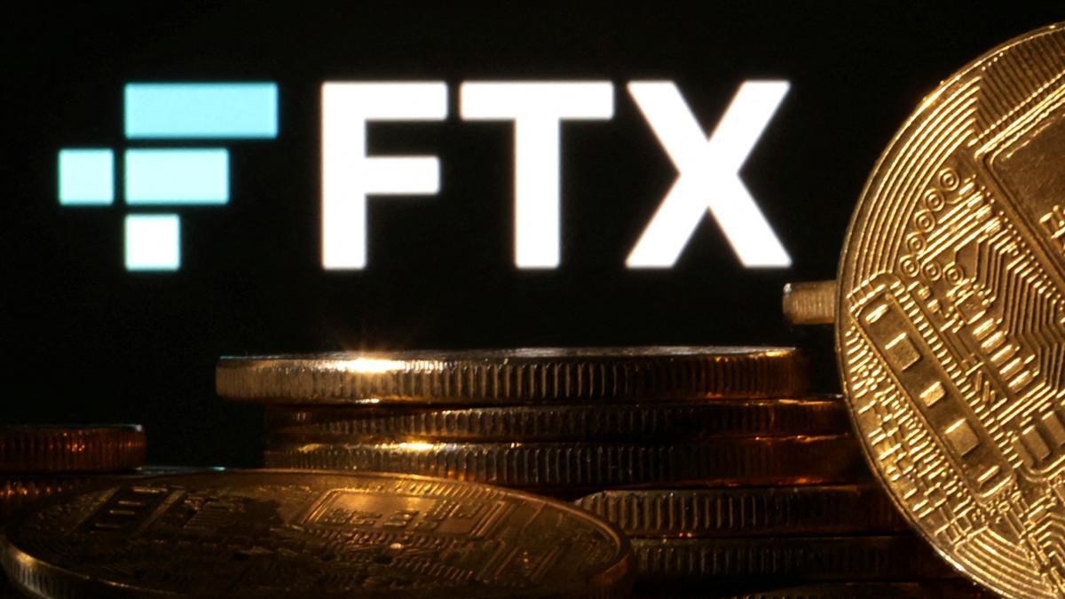 FILE PHOTO: Illustration shows FTX logo and representation of cryptocurrencies