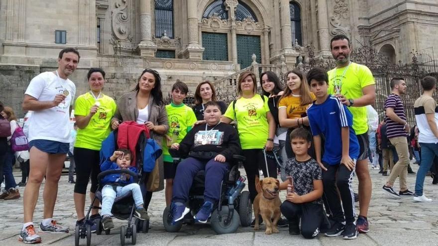 Padre e hijo ofrecen en la carrera de Santiago un ejemplo de superación