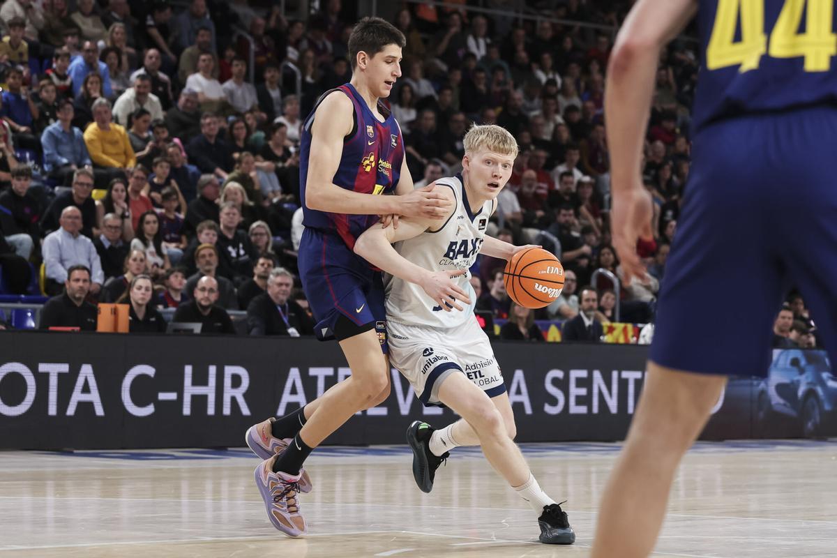 Gustav Knudsen of BAXI Manresa and Nikola Kusturica of FC Barcelona in action during the Spanish League, Liga ACB Endesa, basketball match played between FC Barcelona and BAXI Manresa at Palau Blaugrana on February 15, 2026 in Barcelona, Spain. AFP7 15/02/2026 ONLY FOR USE IN SPAIN. Javier Borrego / AFP7 / Europa Press;2026;ACB;BASKET;SPORT;ZBASKET;ZSPORT;FC Barcelona v BAXI Manresa - Liga ACB Endesa