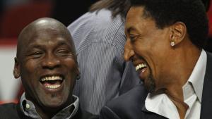 CHICAGO, IL - FEBRUARY 15: Former players Michael Jordan and Scottie Pippen of the Chicago Bulls share a laugh before a game between the Bulls and the Charlotte Bobcats at the United Center on February 15, 2011 in Chicago, Illinois. NOTE TO USER: User expressly acknowledges and agrees that, by downloading and/or using this photograph, User is consenting to the terms and conditions of the Getty Images License Agreement.   Jonathan Daniel/Getty Images/AFP== FOR NEWSPAPERS, INTERNET, TELCOS & TELEVISION USE ONLY ==. HORIZONTAL
