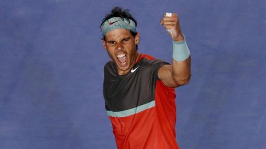 Nadal celebra su victoria ante Federer.