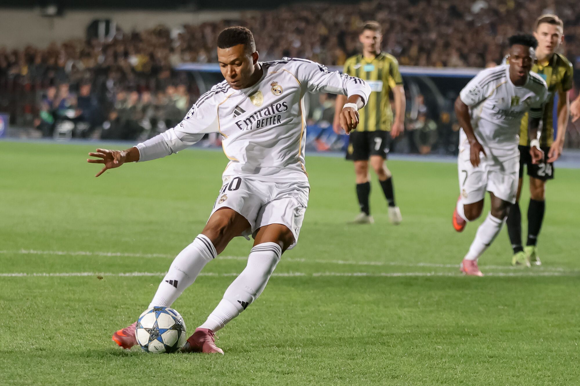 Real Madrid's Kylian Mbappe controls the ball during the Champions League opening phase soccer match between Kairat Almaty and Real Madrid at Ortalyk stadium in Almaty, Kazakhstan, Tuesday, Sept. 30, 2025. (AP Photo/Alikhan Sariyev)