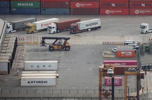 A Maersk container is transported by truck at Zona Franca in Barcelona