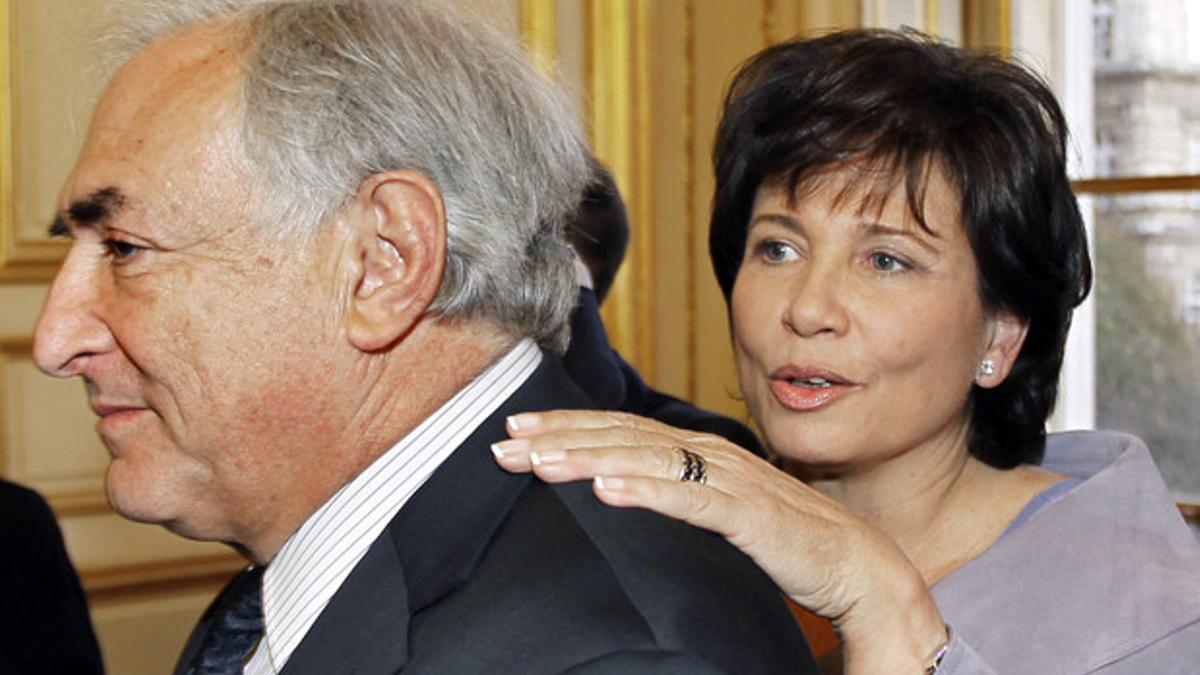 File photo of IMF Managing Director Dominique Strauss-Kahn and his wife Anne Sinclair in the Senate in Paris