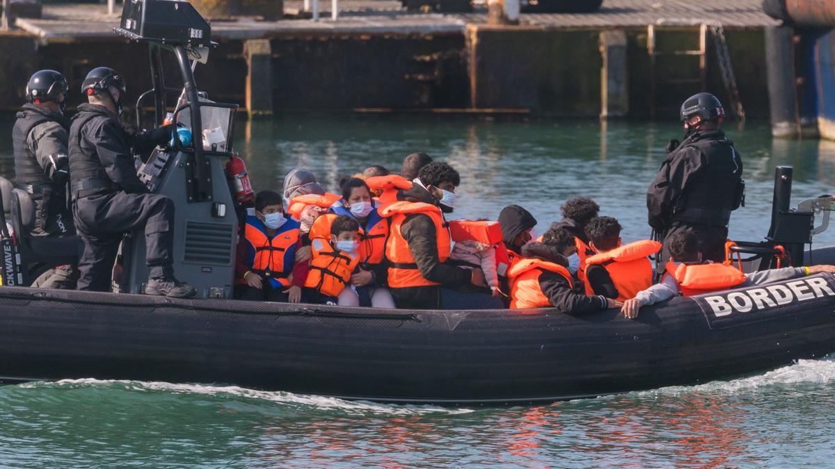 Migrants continue to arrive along Britain's coast seeking asylum