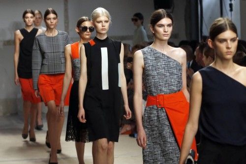 Models present creations by Croatian designer Damir Doma as part of his Spring/Summer 2014 women's ready-to-wear fashion show in Paris