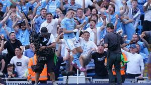 19 May 2024, United Kingdom, Manchester: Manchester Citys Phil Foden celebrates scoring his sides second goal during the English Premier League soccer match between Manchester City and West Ham United at the Etihad Stadium. Photo: Martin Rickett/PA Wire