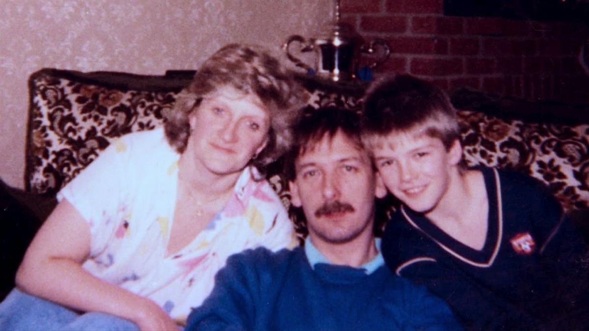 David Beckham con sus padres
