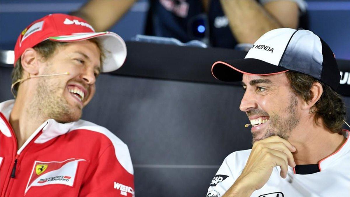 Vettel y Alonso, durante sus etapas en Ferrari y McLaren