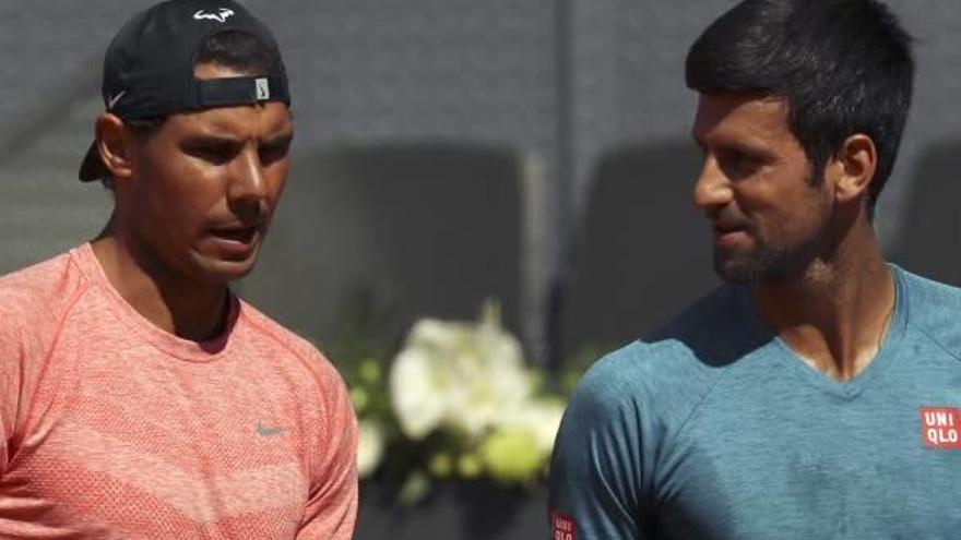 Nadal y Djokovic, el pasado miércoles durante un entrenamiento conjunto en Madrid.