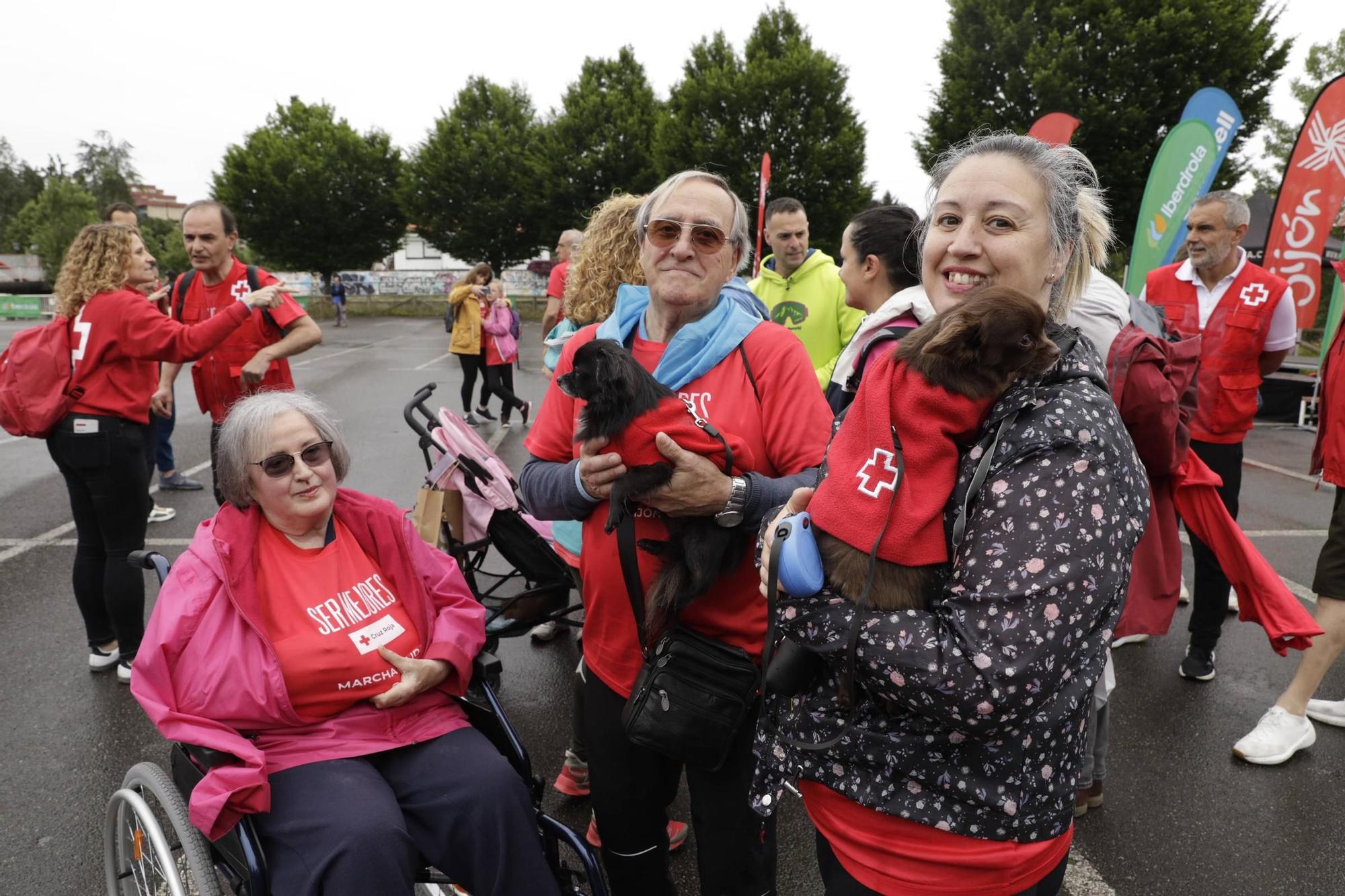 Así fue la marcha solidaria de Cruz Roja en Gijón (en imágenes)