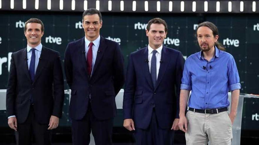 Los candidatos en un debate anterior.