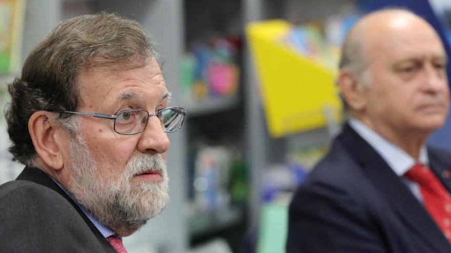 Mariano Rajoy y Jorge Fernández Díaz.