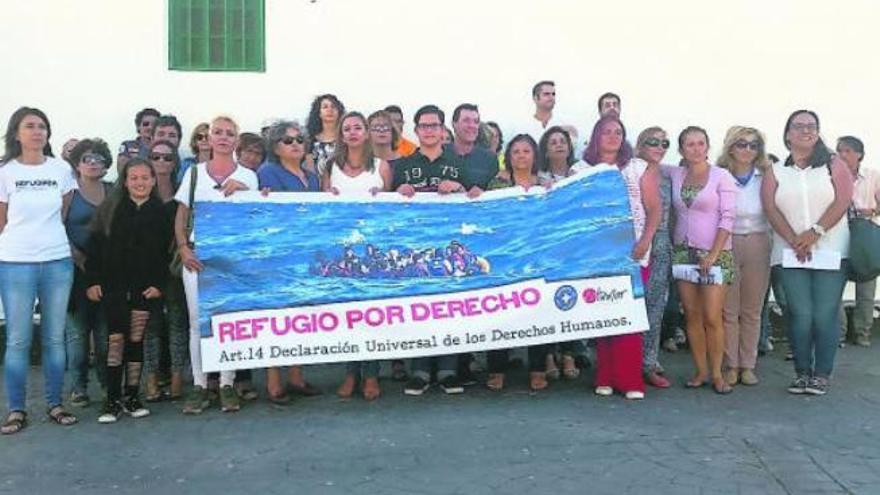 Acto de solidaridad con los refugiados en Playa Honda