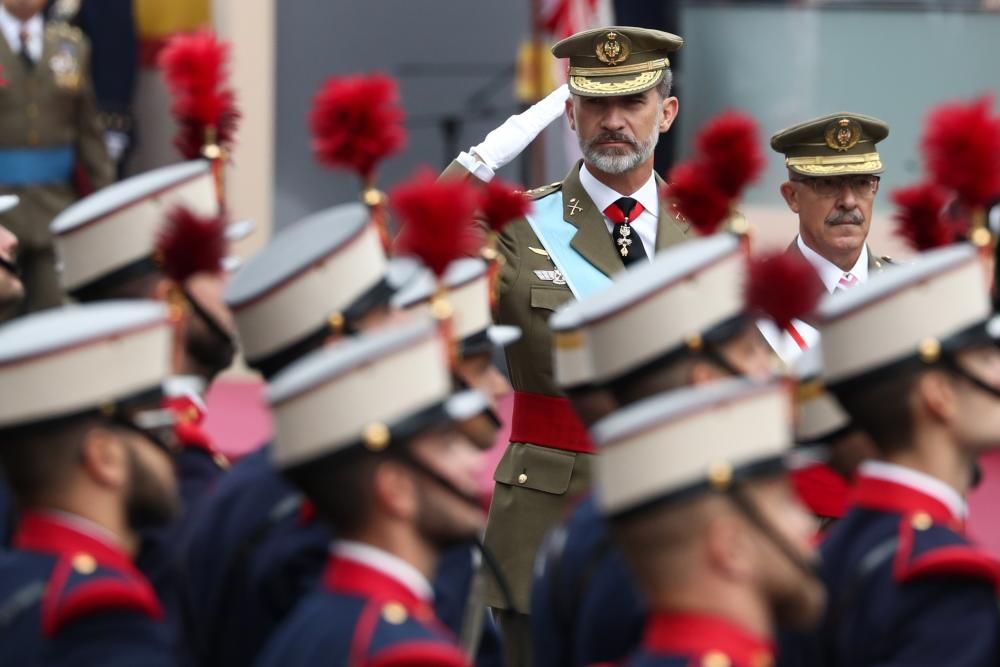 Spain's King Felipe arrives to attend a parade ...