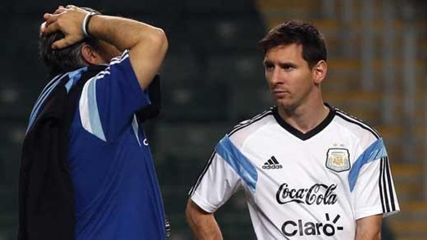 Martino y Messi, en un entrenamiento.