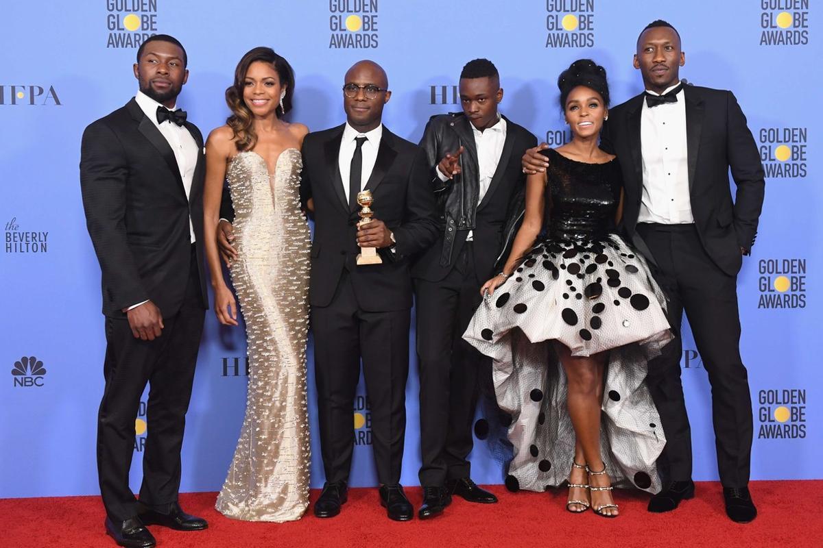 BEVERLY HILLS, CA - JANUARY 08: (L-R) Actors Trevante Rhodes and Naomie Harris, director Barry Jenkins, actors Ashton Sanders, Janelle Monae and Mahershala Ali of ’Moonlight,’ winner of Best Motion Picture - Drama, pose in the press room during the 74th Annual Golden Globe Awards at The Beverly Hilton Hotel on January 8, 2017 in Beverly Hills, California.   Kevin Winter/Getty Images/AFP