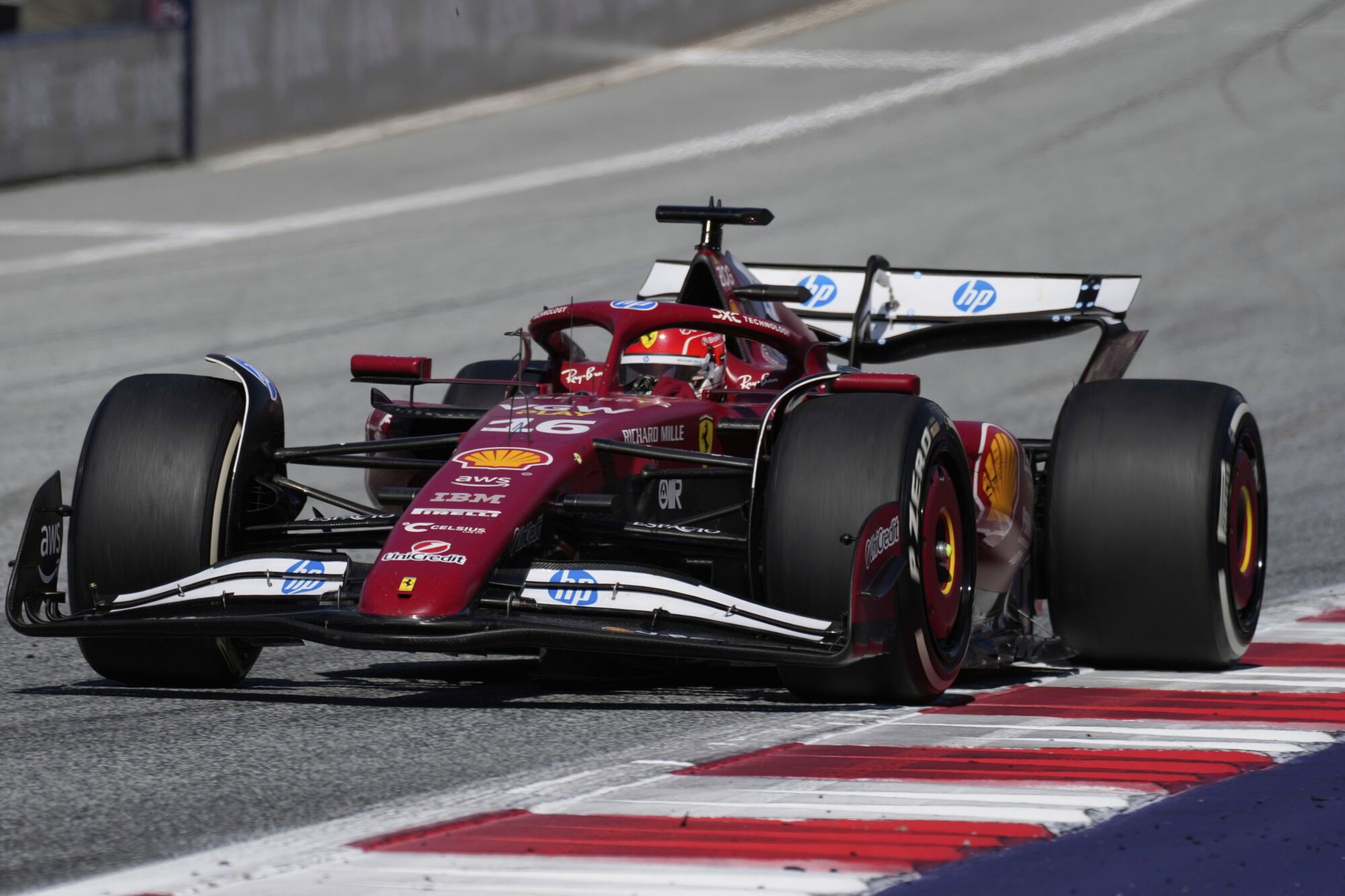 Ferrari driver Charles Leclerc of Monaco in action during the Austrian Formula One Grand Prix in Spielberg, Austria, Sunday, June 29, 2025. (AP Photo/Darko Bandic)