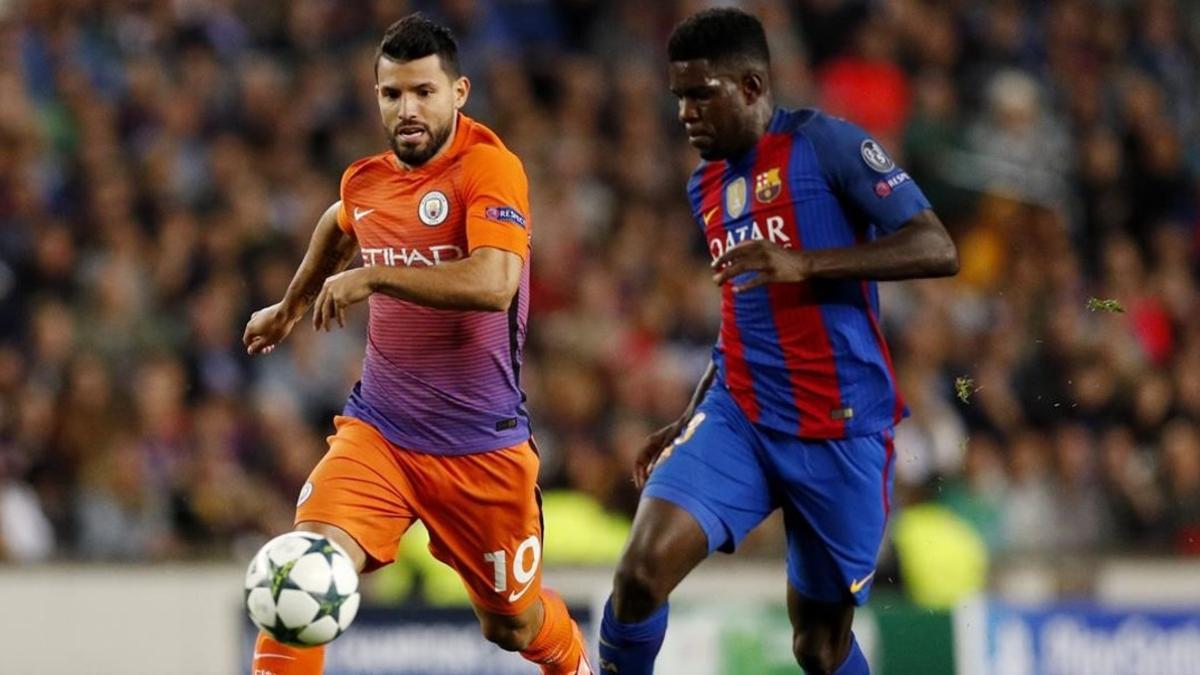 Umtiti persigue al Kun Agüero durante el Barça-City del Camp Nou.