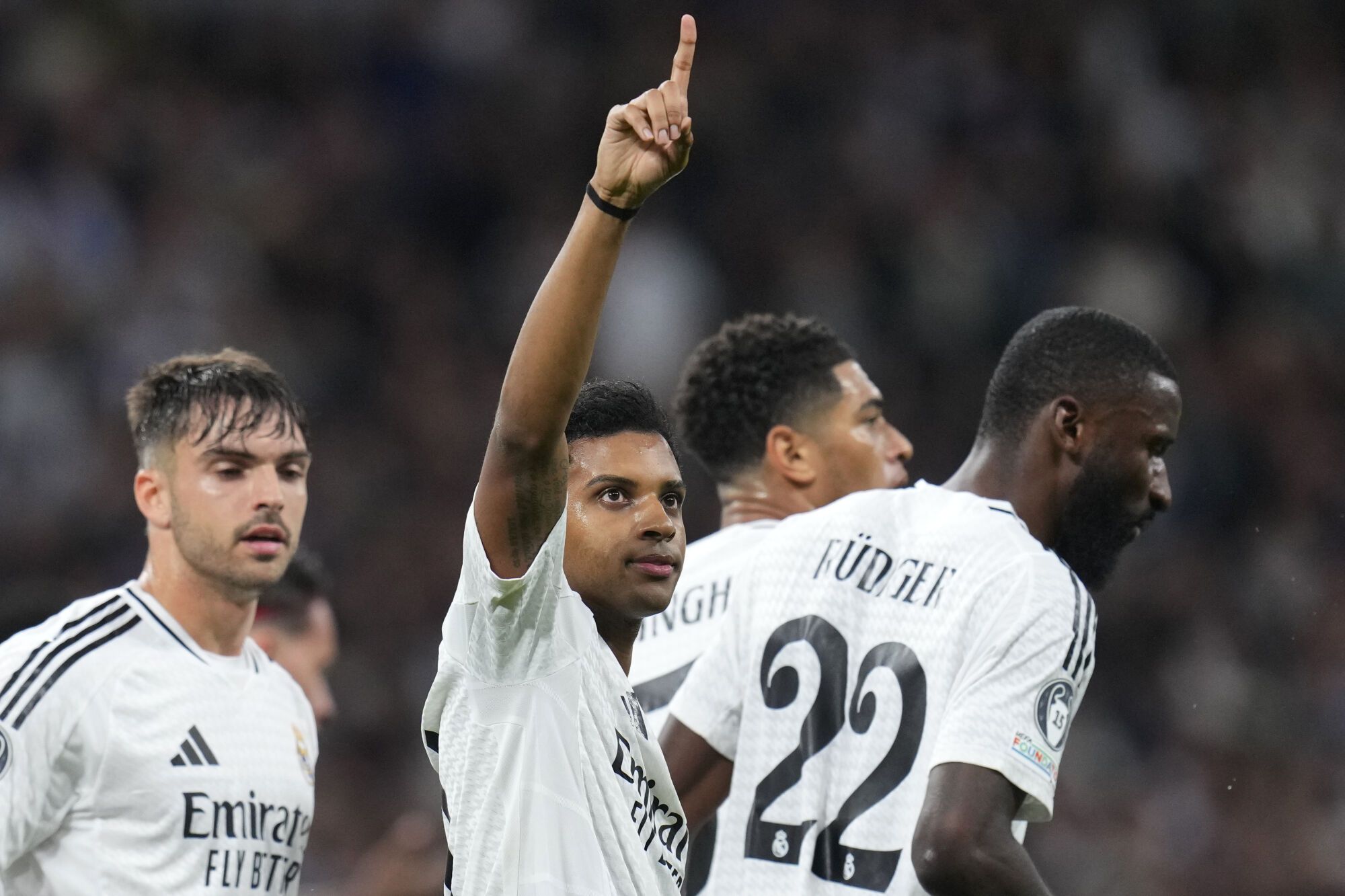 Real Madrid's Rodrygo celebrates after scoring his side's 2nd goal during the Champions League opening phase soccer match between Real Madrid and FC Salzburg at the Santiago Bernabeu stadium in Madrid, Wednesday, Jan. 22, 2025. (AP Photo/Manu Fernandez)